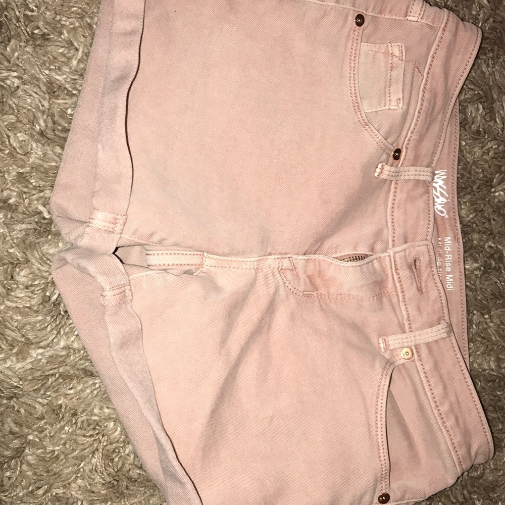 Light pink shorts.